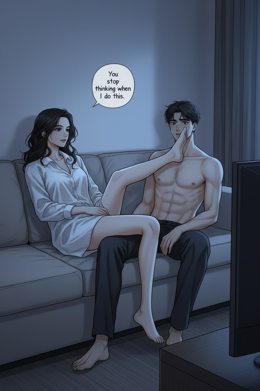 ONE SINGLE PANEL
Quiet evening hotel sofa.
Only the television illuminates the room with soft shifting blue light.
Sandrine lies stretched across the sofa with her legs resting partly over the man’s lap, oversized white shirt loose around her thighs.
As they watch the film together, she slowly lifts one bare foot and rests it lightly across the lower half of his face without looking away from the screen.
The gesture feels casual, almost absentminded, yet completely intentional.
The man immediately stills beneath the contact.
Only then does Sandrine glance sideways toward him with a faint private smile.
The atmosphere feels intimate, domestic, teasing, and emotionally charged.
NO explicit sexuality
NO nudity
NO explicit anatomy
ONE speech bubble only. She says:
“You stop thinking when I do this.”